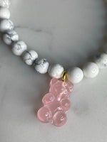 Natural gemstone bracelet with pink resin gummy bear.