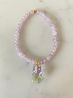 Pink bead bracelet with gummy bear charm