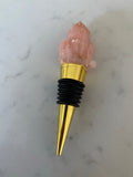 Blush and gold wine stopper.