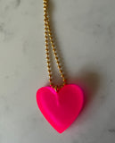 Hand poured resin neon heart necklace