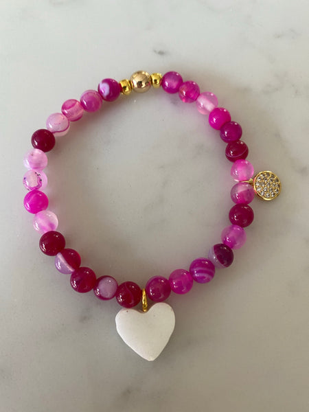 Gemstone bracelet with white resin heart and gold plated charm