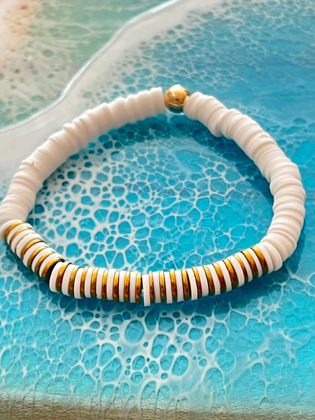 Gold and white heishi bead bracelet.